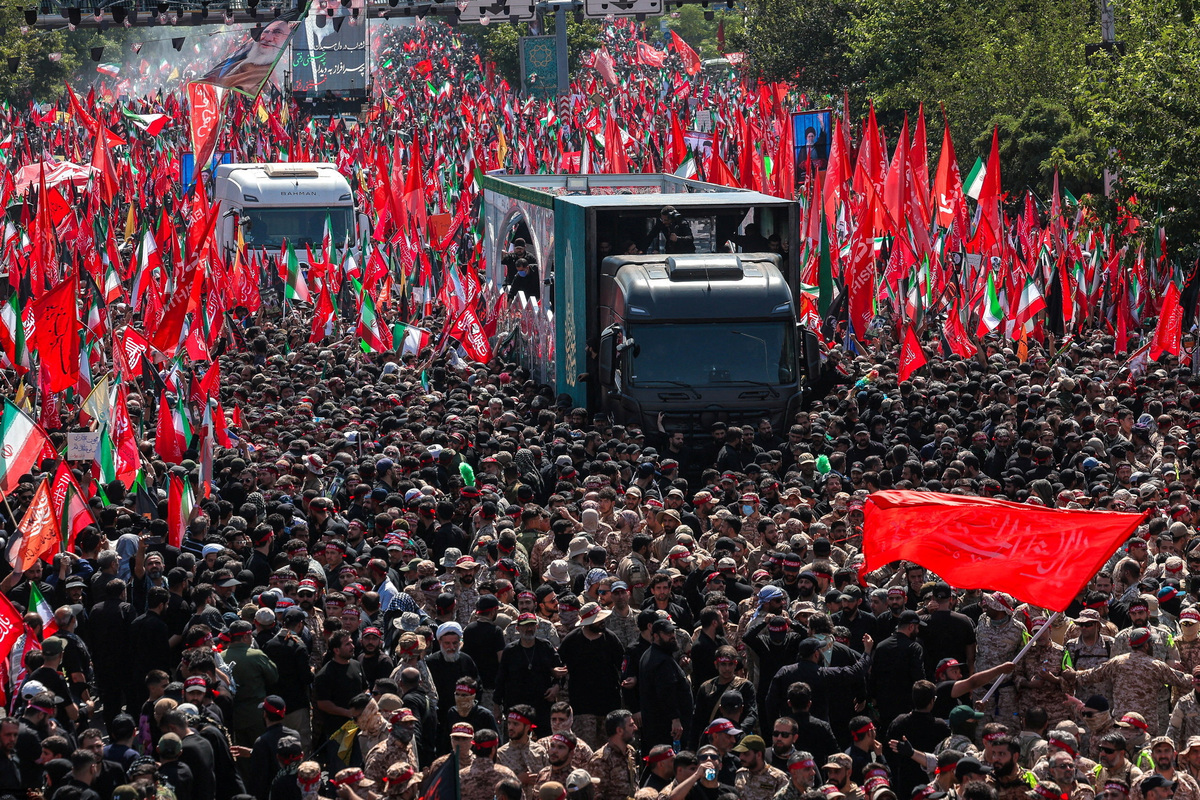 A vehicle carrying coffins of Iran's late Supreme Leader Ayatollah Ali Khamenei and his family members, makes its way as people attend a funeral procession for Khamenei, who was killed on February 28 in Israeli and U.S. airstrikes, in Tehran, Iran July 6, 2026. Office of the Iranian Supreme Leader/ Handout via REUTERS