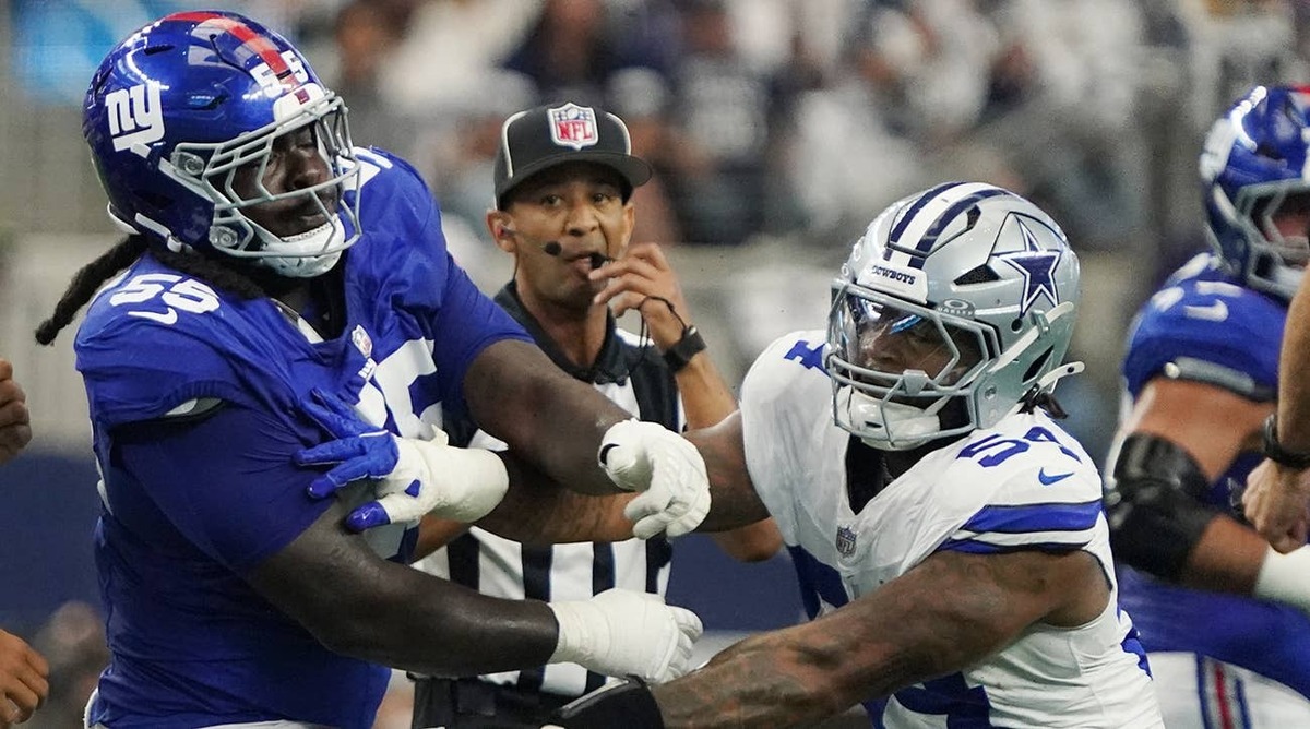 Sep 14, 2025; Arlington, Texas, USA; New York Giants offensive tackle James Hudson III (55) is called for a unnecessary roughness after a play against Dallas Cowboys defensive end Sam Williams (54) during the first quarter at AT&T Stadium. Mandatory Credit: Raymond Carlin III-Imagn Images Raymond Carlin III-Imagn Images