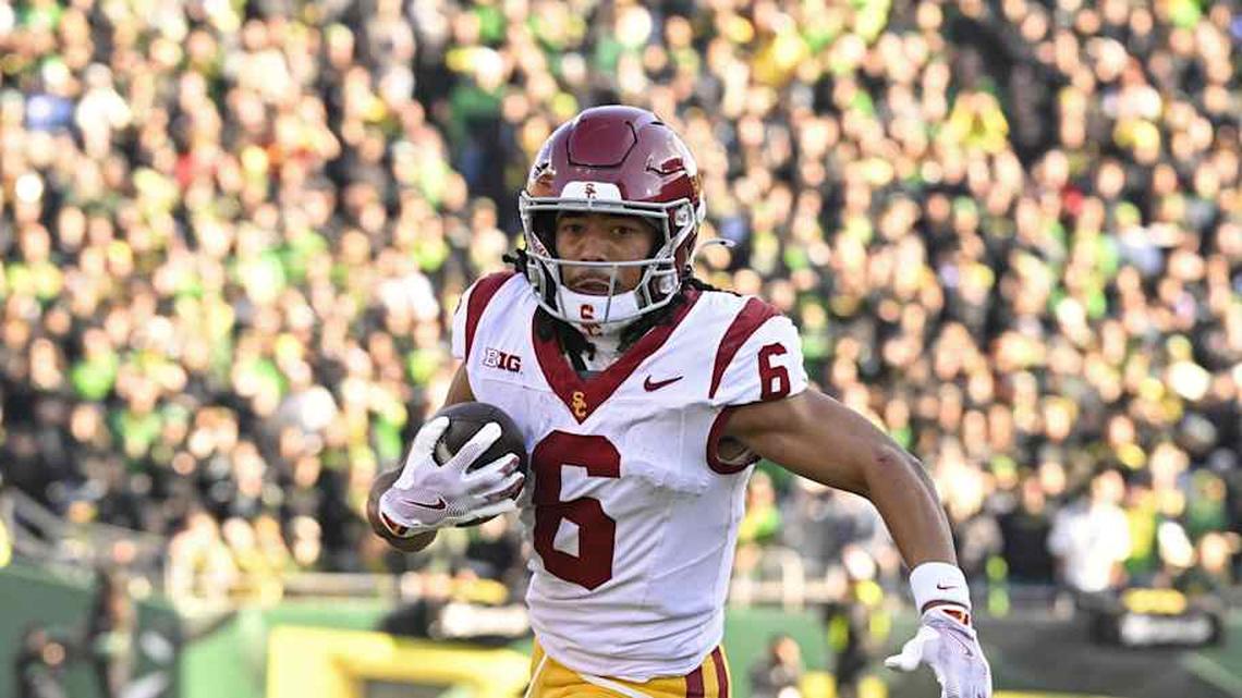  Nov 22, 2025; Eugene, Oregon, USA; Southern California Trojans wide receiver Makai Lemon (6) runs with the ball during the first half against the Oregon Ducks at Autzen Stadium. Mandatory Credit: Troy Wayrynen-Imagn Images | Troy Wayrynen-Imagn Images 