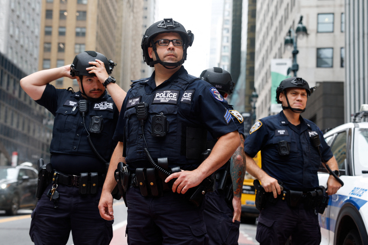 NYPD officers near a building on 42nd Street, which was reported to have structural issues, in New York City, U.S., July 7, 2026. REUTERS/Jordan Tovin