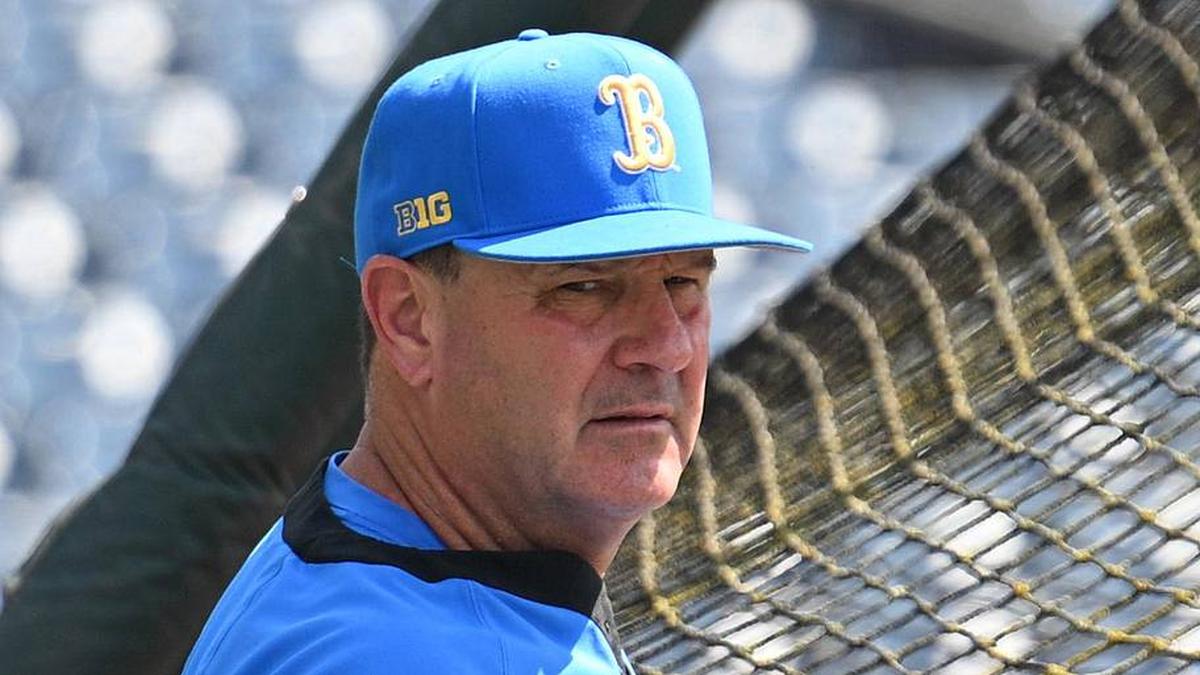  Jun 14, 2025; Omaha, Neb, USA; UCLA Bruins head coach John Savage watches the team warm up before the game against the Murray State Races at Charles Schwab Field. Mandatory Credit: Steven Branscombe-Imagn Images | Steven Branscombe-Imagn Images 