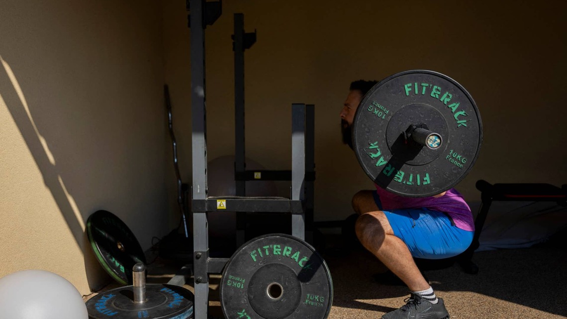 You do not need to stop lifting because of joint pain