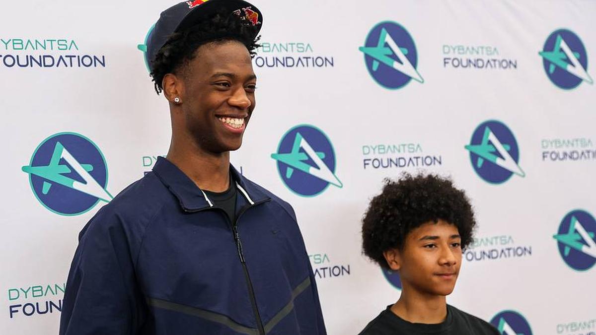  Brockton's AJ Dybantsa spends time with Davis School students after declaring for the 2026 NBA Draft at Davis School (K-8) in Brockton, Massachusetts on Thursday, April 23, 2026. | Jason Snow / The Enterprise / USA TODAY NETWORK via Imagn Images 