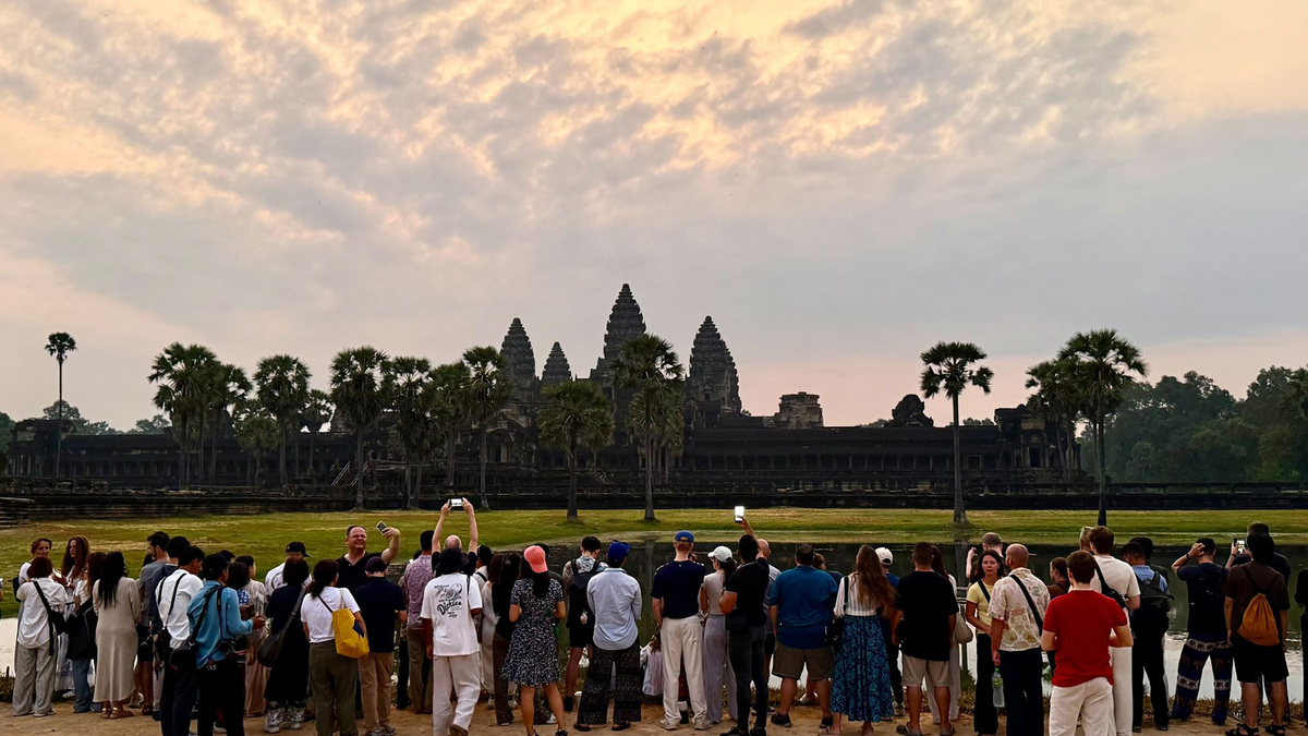 Sunrise at Angkor Wat temple, with tourists easily getting the shot they want as relatively few travellers head for Cambodia, due to conflict. (Carola Frentzen/dpa/TNS)