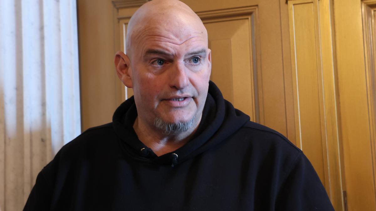 U.S. Sen. John Fetterman, D-Pa., speaks with reporters in the halls of the U.S. Capitol on Feb. 10, 2026, in Washington, D.C. (Michael M. Santiago/Getty Images/TNS)