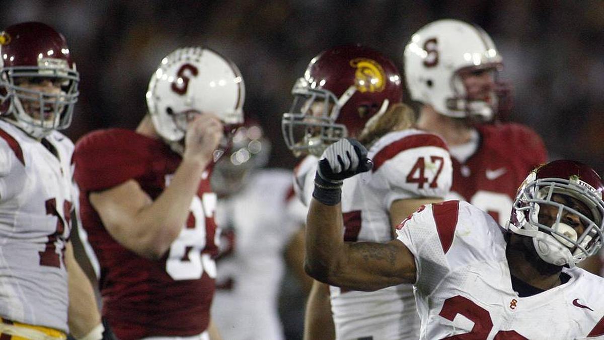  Nov 15, 2008; Stanford, CA, USA; Southern California Trojans strong safety Will Harris (26) celebrates a defensive stop against the Stanford Cardinal offense in the third quarter at Stanford Stadium in Stanford, CA. USC defeated Stanford 45-23. Mandatory Credit: Cary Edmondson-Imagn Images | Cary Edmondson-Imagn Images 