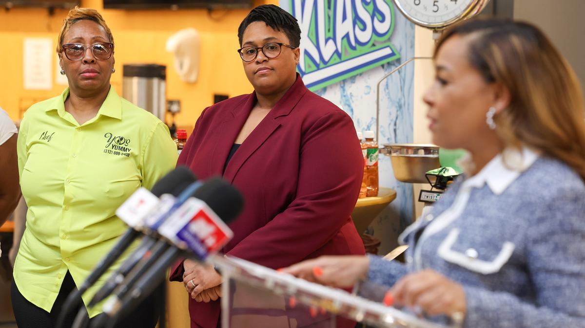 Melody Winston, right, Senior Executive of Living Fresh Market speaks during a press conference about the negative impact the SNAP cuts will have on her business and community at Living Fresh Market on April 27, 2026, in Forest Park. Looking on is Danielle Perry, Vice President of Policy and Advocacy at the Food Depository, center, and Yolanda Wallace, owner of Yo’s Yummy’s. (Stacey Wescott/Chicago Tribune/TNS)