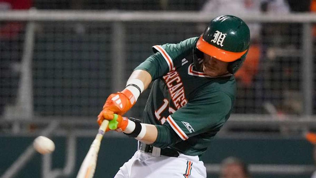  Miami Catcher Alex Sosa hitting a homerun against Boston College | Miami Hurricanes Athletics 
