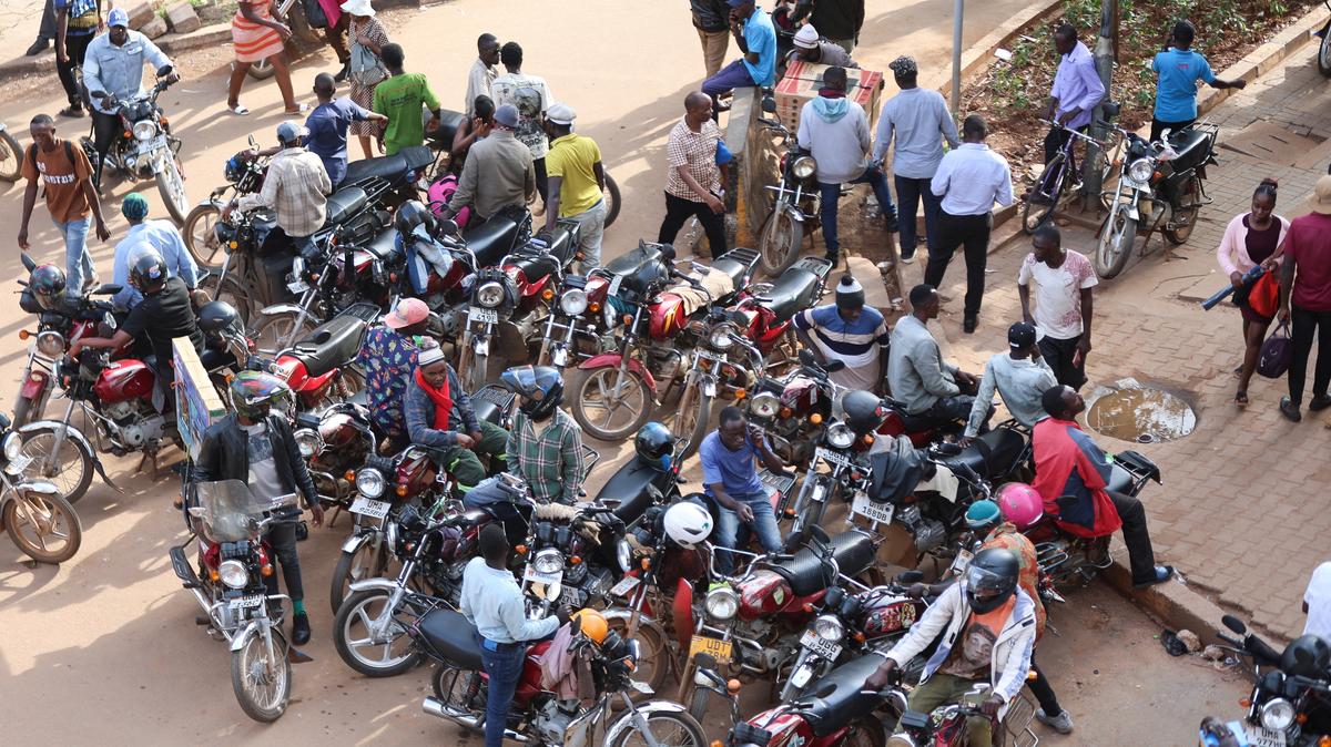 Motorcycle taxis wait for passengers as authorities intensify efforts to contain a new Ebola outbreak caused by the Bundibugyo virus, in downtown Kampala, Uganda May 26, 2026. REUTERS/Michael Muhati