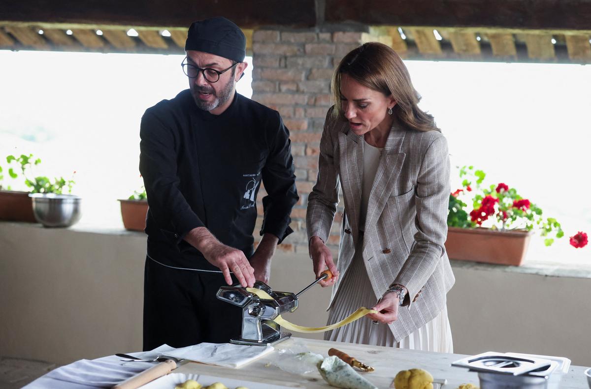 Britain's Kate, Princess of Wales, helps prepare lunch at rural Agriturismo 'Al Vigneto' as she concludes a two-day visit to the region, in Felino, in the province of Parma, Italy, May 14, 2026. REUTERS/Phil Noble/Pool