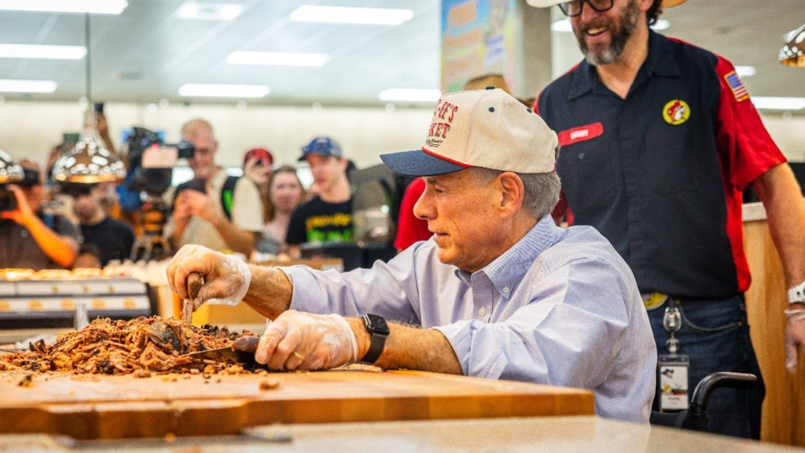 Watch Gov. Greg Abbott serve brisket at Buc-ee's newest Texas store