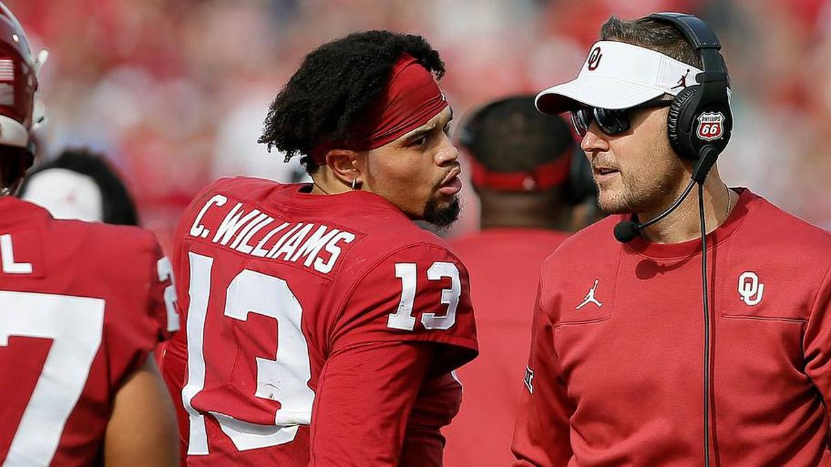  Coach Lincoln Riley talks with Caleb Williams (13) during the Sooners' 28-21 win against Iowa State on Nov. 20. They are now reunited at USC. cover | BRYAN TERRY/THE OKLAHOMAN / USA TODAY NETWORK 