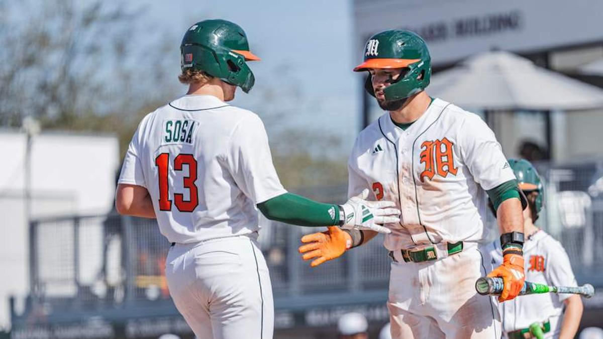  Miami Hurricanes catcher Alex Sosa (13) and right fielder Derek Williams (2) against Lafayette | Miami Hurricanes Athletics 