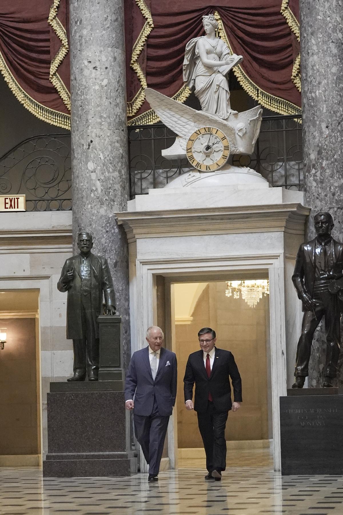 House Speaker Mike Johnson (R-La.), right, walks with King Charles III ahead of his address to a joint meeting of Congress in honor of the 250th anniversary of American independence at the Capitol in Washington, on Tuesday, April 28, 2026. (Salwan Georges/The New York Times)