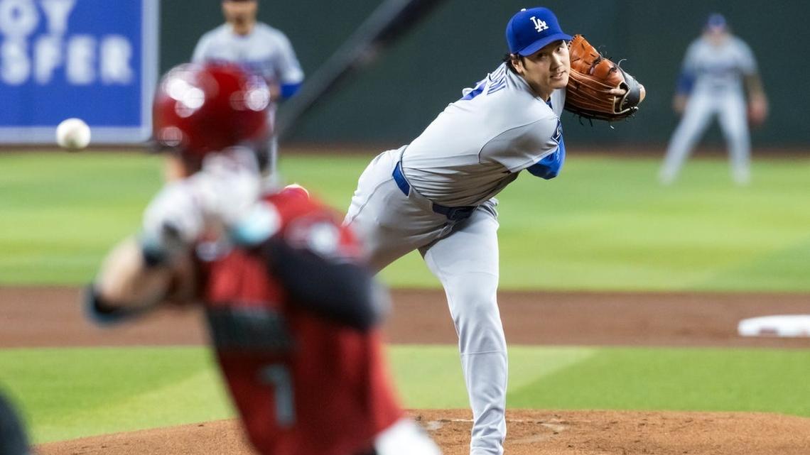 Shohei Ohtani shines on mound, at plate as Dodgers blank D-backs 