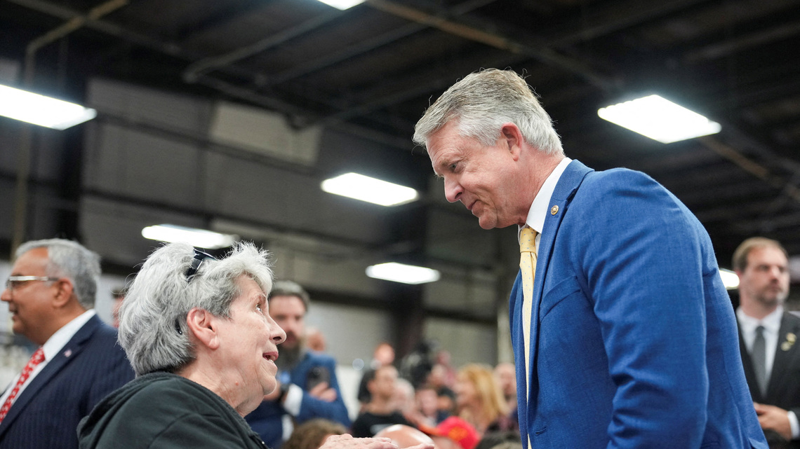 Rush of money, campaign stops show Republicans feel vulnerable in Iowa, Kansas 