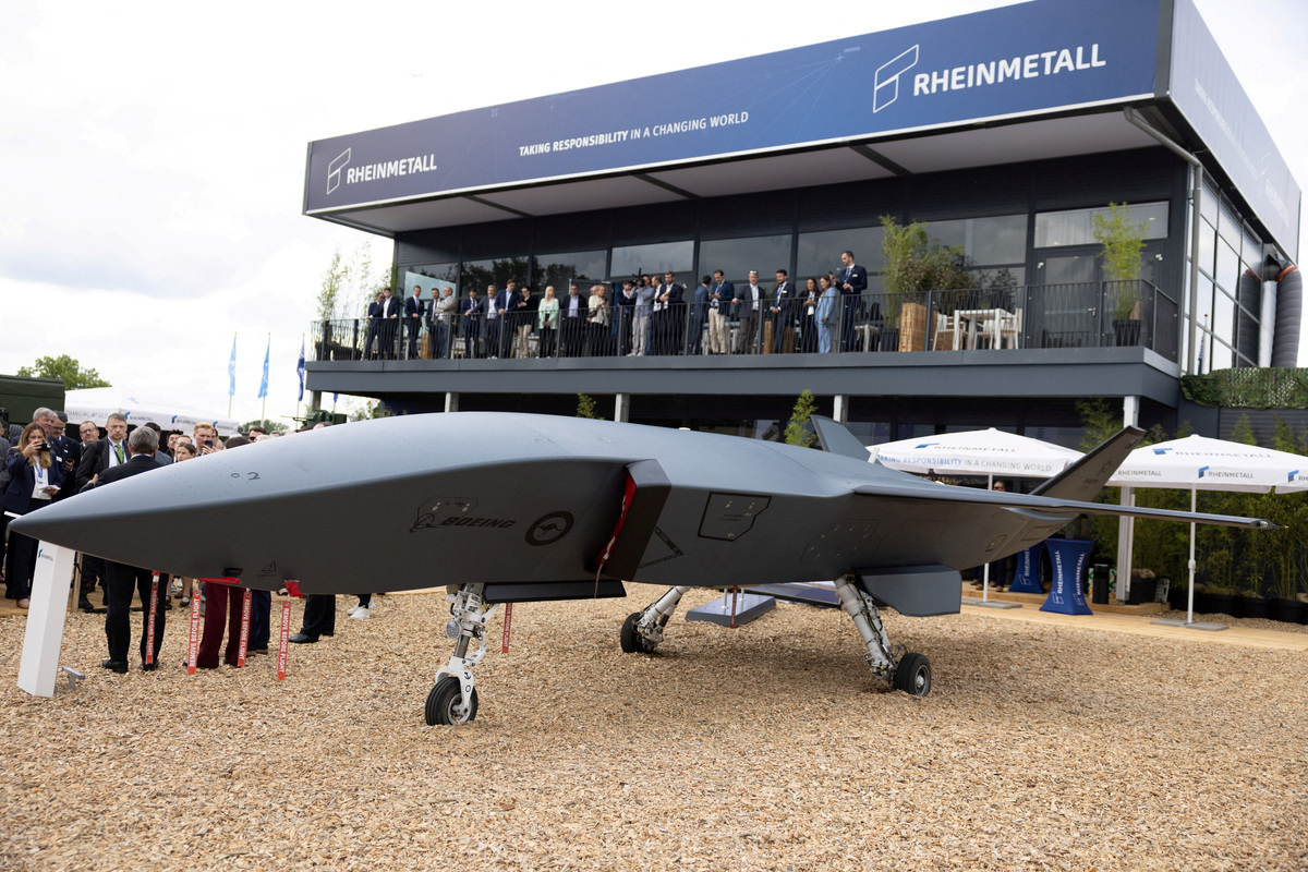 FILE PHOTO: A Boeing MQ-28 Ghost Bat unmanned combat aerial vehicle under development by Boeing Australia at the opening day of the International Aerospace Exhibition ILA at Schoenefeld Airport in Berlin, Germany, June 10, 2026. REUTERS/Axel Schmidt/File Photo