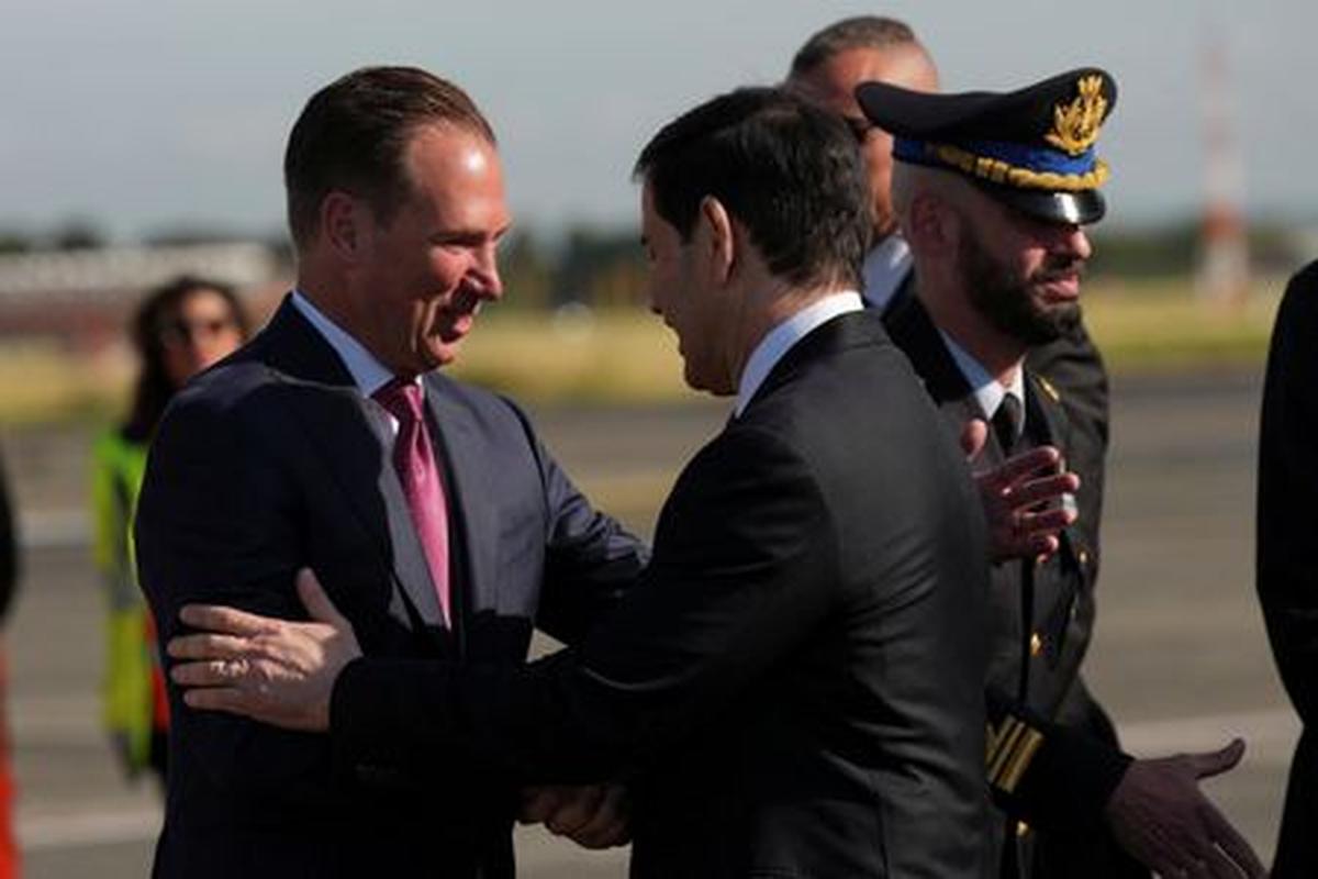 U.S. Secretary of State Marco Rubio meets U.S. Ambassador to the Holy See Brian Burch upon his arrival for a two-day visit to Italy and the Vatican, at Ciampino airport, in Rome, Italy, May 7, 2026. Andrew Medichini/Pool via REUTERS