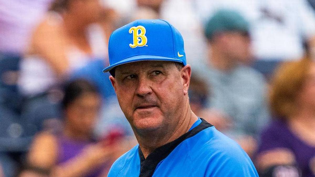  Jun 16, 2025; Omaha, Neb, USA; UCLA Bruins head coach John Savage walks off the field before the game against the LSU Tigers at Charles Schwab Field. Mandatory Credit: Dylan Widger-Imagn Images | Dylan Widger-Imagn Images 