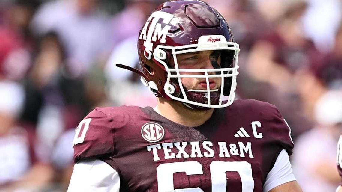  Oct 5, 2024; College Station, Texas, USA; Texas A&M Aggies offensive lineman Trey Zuhn III (60) walks on the field in the first half against the Missouri Tigers at Kyle Field. Mandatory Credit: Maria Lysaker-Imagn Images. | Maria Lysaker-Imagn Images 