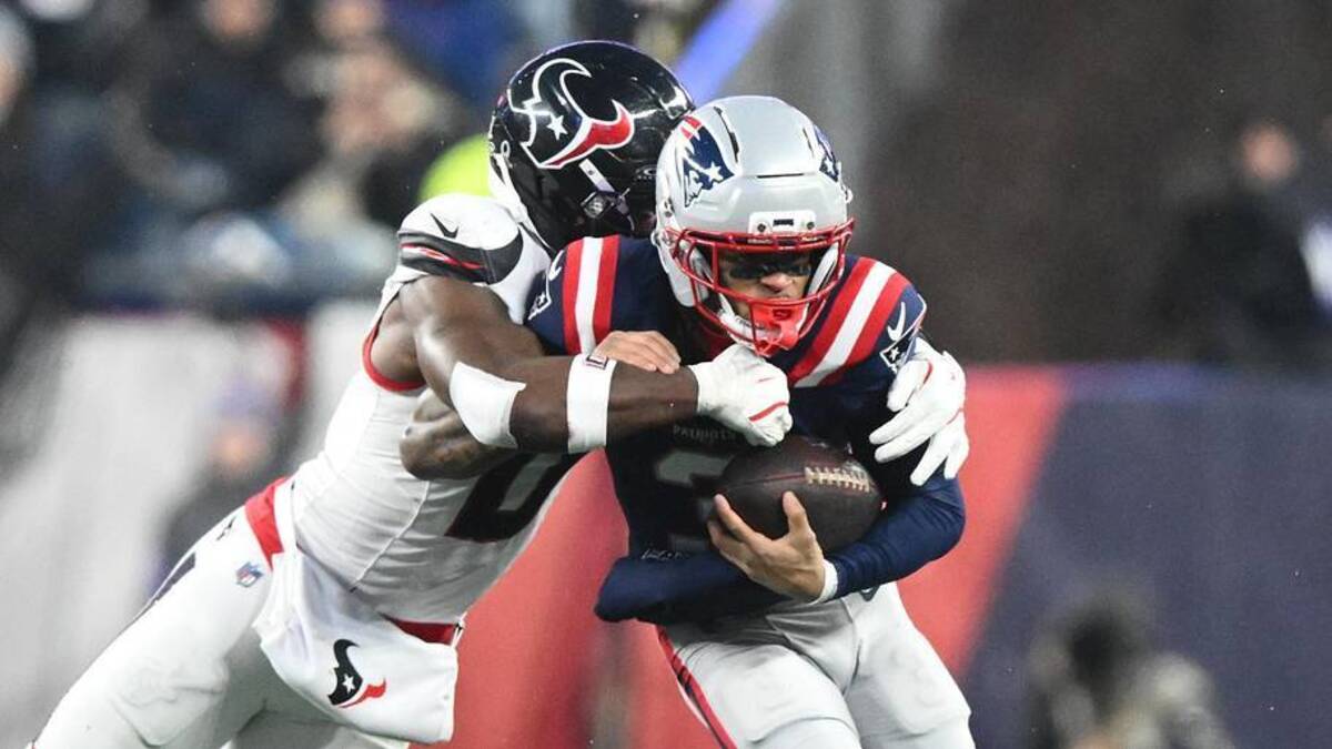  Jan 18, 2026; Foxborough, MA, USA; New England Patriots wide receiver DeMario Douglas (3) moves the ball while defended by Houston Texans linebacker Azeez Al-Shaair (0) in an AFC Divisional Round game at Gillette Stadium. Mandatory Credit: Brian Fluharty-Imagn Images | Brian Fluharty-Imagn Images 