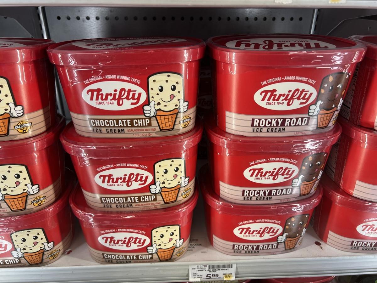 Containers of Thrifty brand ice cream on sale in a supermarket.