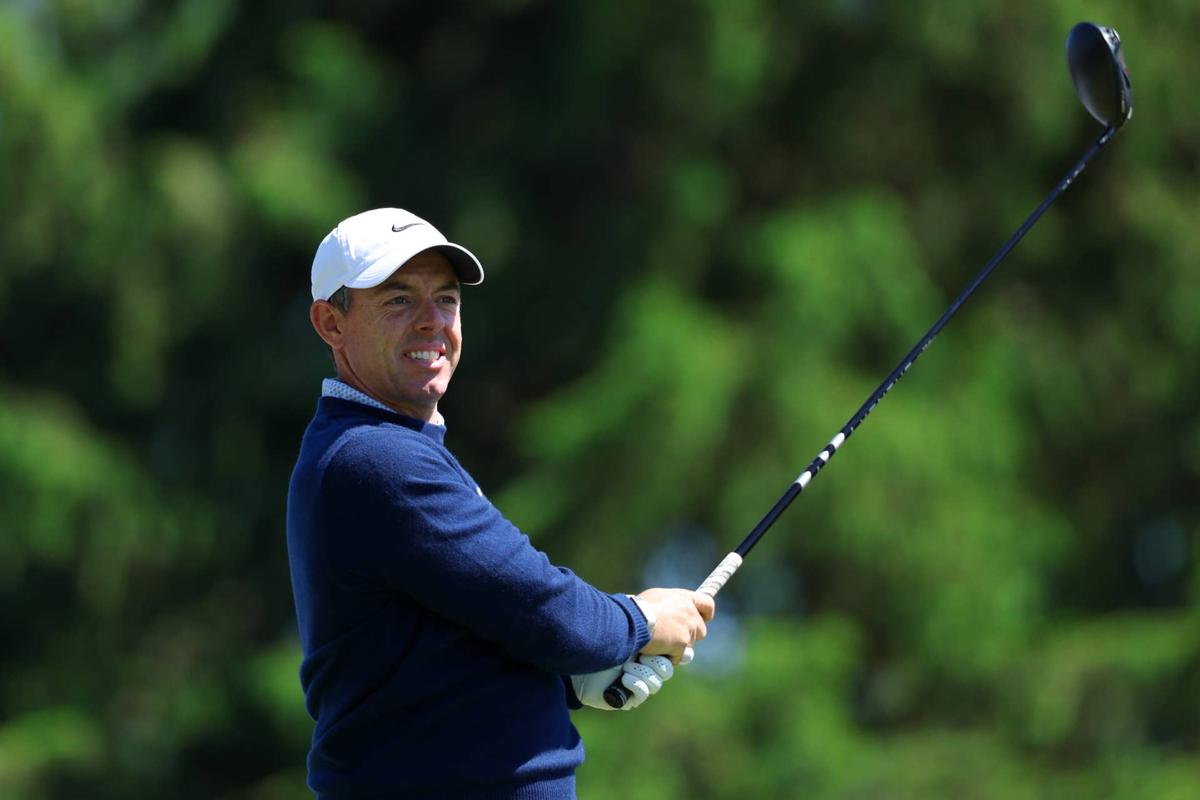  May 12, 2026; Newtown Square, Pennsylvania, USA; Rory McIlroy plays a tee shot on hole 2 during a practice round of the PGA Championship golf tournament at Aronimink Golf Club. Mandatory Credit: Bill Streicher-Imagn Images 