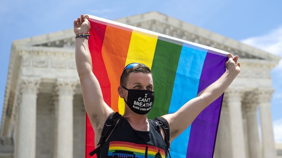 Joseph Fons waves a rainbow flag in front of the Supreme Court after the high court released a decision that bans LGBTQ employment discrimination on June 15, 2020 in Washington, D.C. File Photo by Kevin Dietsch/UPI