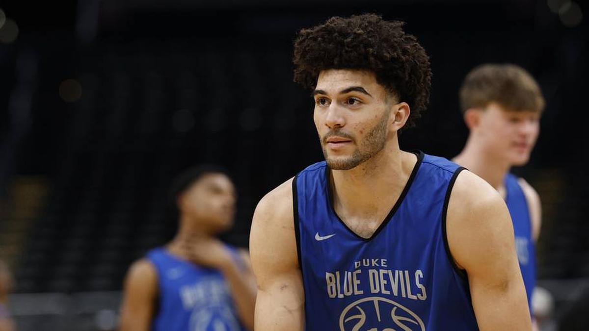  Mar 26, 2026; Washington, DC, USA; Duke Blue Devils forward Cameron Boozer (12) stands on court during a practice session ahead of the east regional of the men's 2026 NCAA Tournament at Capital One Arena. | Geoff Burke-Imagn Images 