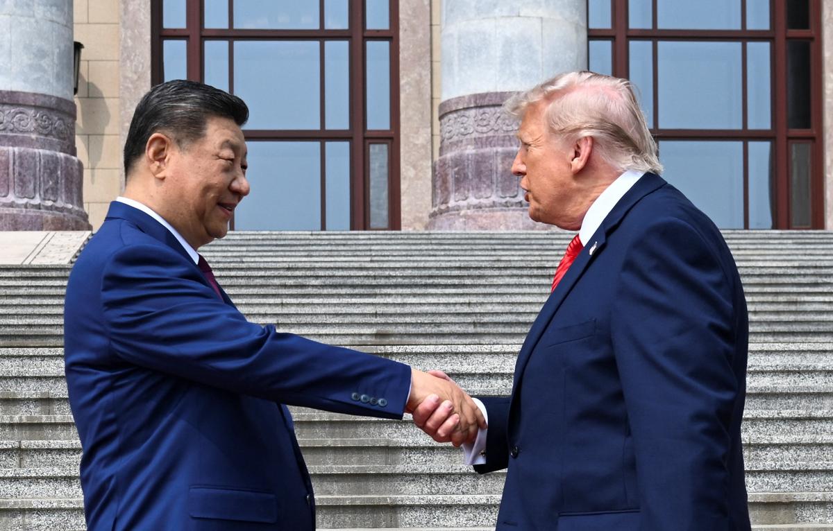 The scene as U.S. President Donald Trump participates in events at the Great Hall of the People and does a greeting with the President of the People’s Republic of China Xi Jinping May 14, 2026, in Beijing China during a trip focused on trade, regional security, and strengthening bilateral ties between the world’s two largest economies. Kenny Holston/Pool via REUTERS