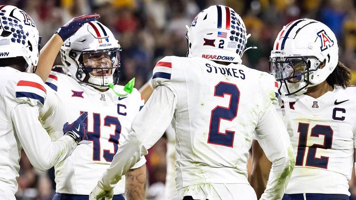  Nov 28, 2025; Tempe, Arizona, USA; Arizona Wildcats defensive back Treydan Stukes (2) celebrates with Ayden Garnes (9), Dalton Johnson (43) and Genesis Smith (12) after an interception against Arizona State Sun Devils in the second half during the 99th Territorial Cup at Mountain America Stadium. Mandatory Credit: Mark J. Rebilas-Imagn Images | Mark J. Rebilas-Imagn Images 