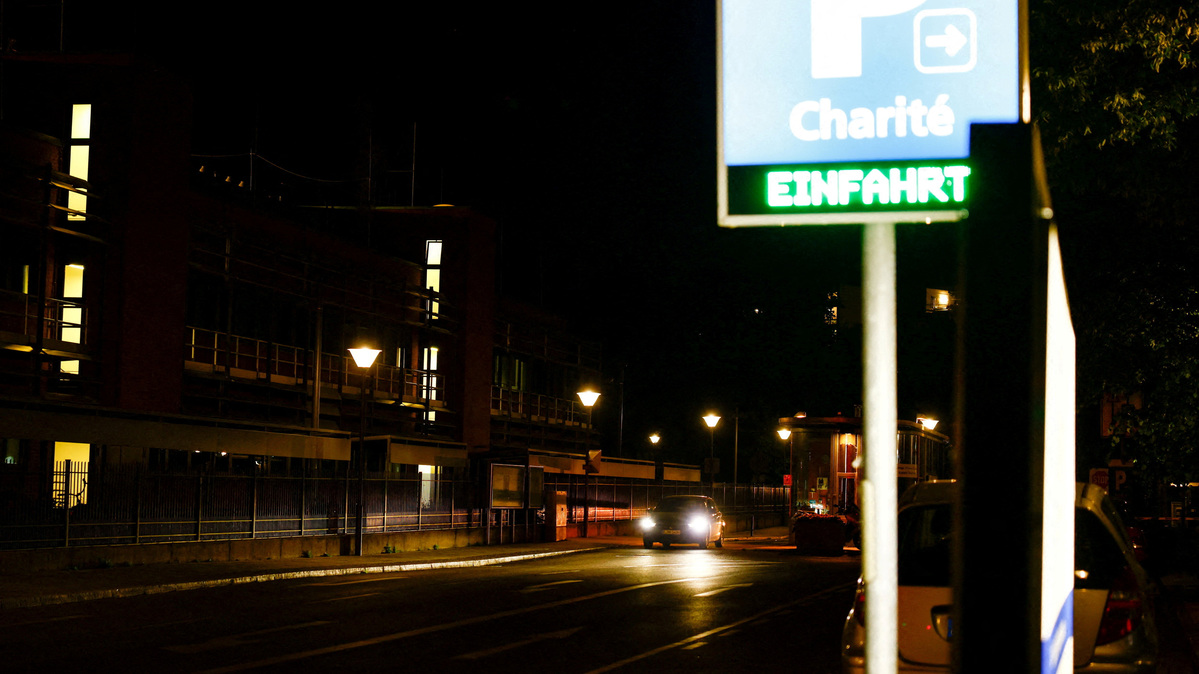 A car drives near the Charite University Hospital, where a U.S. citizen who contracted Ebola in the Democratic Republic of Congo would be admitted to a special isolation ward, according to Germany's health ministry, in Berlin, Germany, May 20, 2026.    REUTERS/Axel Schmidt