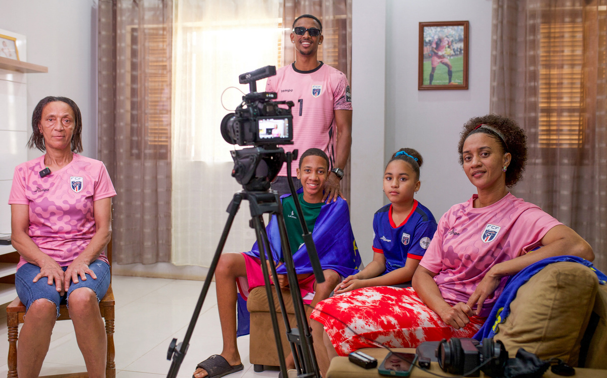 Ana Candida Evora, the mother of of Cape Verde's goalkeeper Vozinha, poses for a photograph with other family members, during an interview with Reuters, at her home in Mindelo, Sao Vicente, Cape Verde, June 16, 2026. REUTERS/Davidson Alves