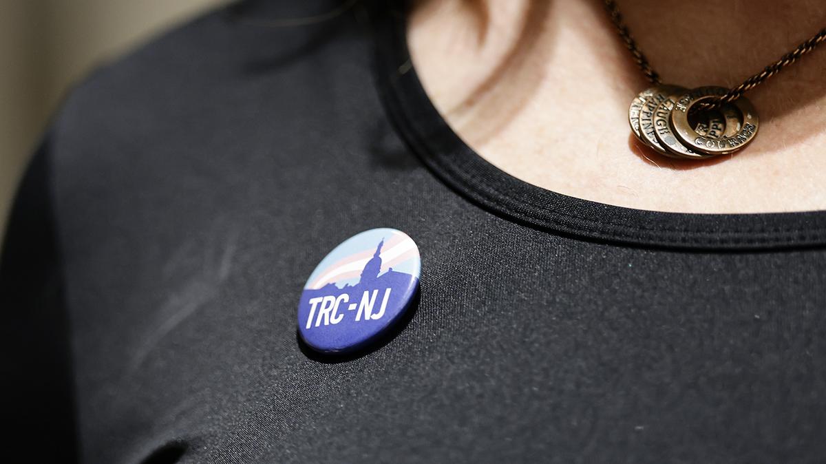 Melissa Firstenberg, a South Jersey transgender woman and LGBTQ+ rights advocate, wears her Transgender Rights Coalition of New Jersey pin as Collingswood adopts a resolution for the Trans Day of Visibility in March. (Yong Kim/The Philadelphia Inquirer/TNS)