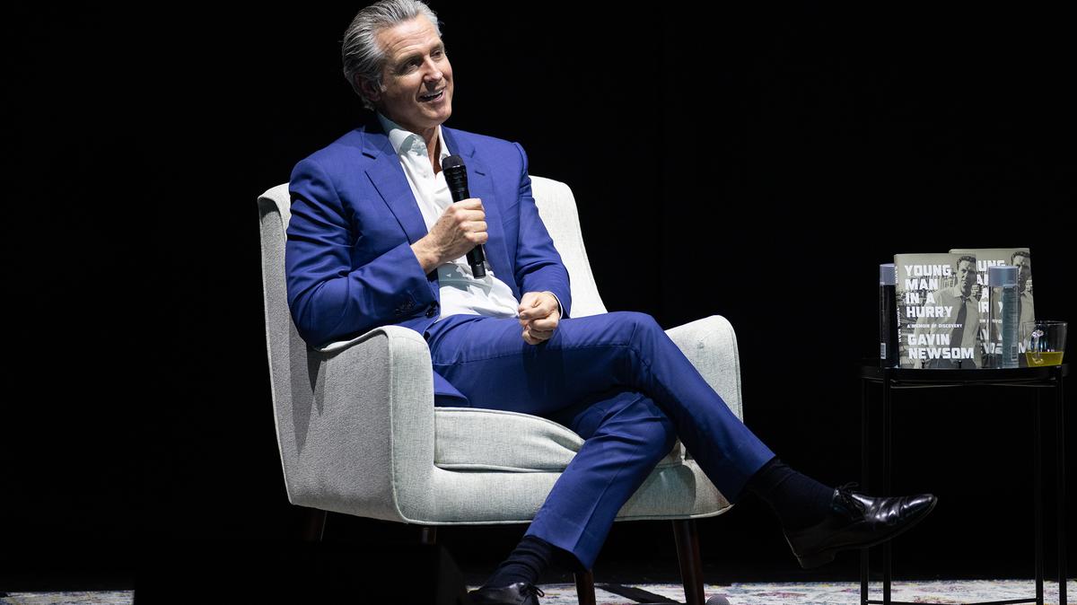 California Gov. Gavin Newsom sits at an event promoting his book "Young Man in a Hurry" on Feb. 28, 2026. Readers criticize the governor’s reversal on his position on Israel. 
