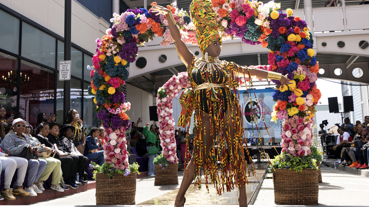 A model wearing a design from Brick House Accessories walks the runway during a Bay Area Black Fashion Expo show to celebrate Juneteenth, Friday, June 19, 2026 in Emeryville, Calif. (D. Ross Cameron for the Bay Area News Group)