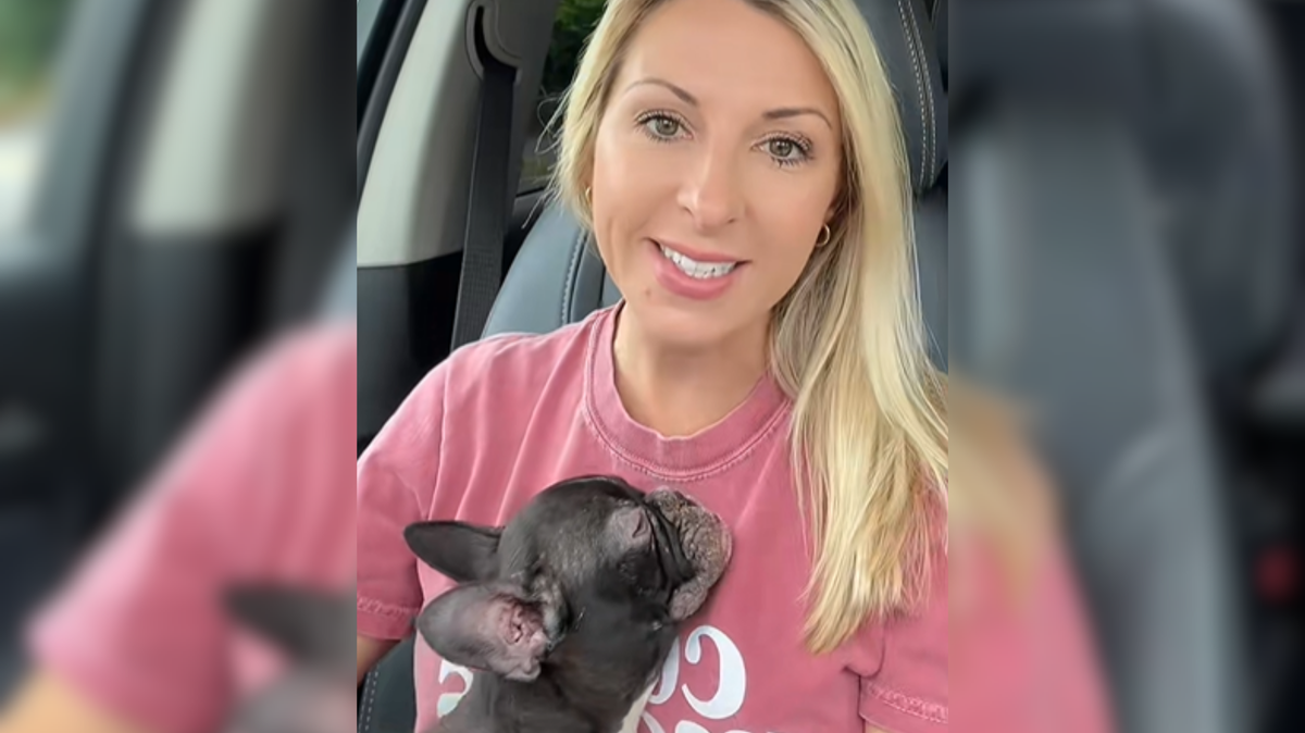 Crystal Floyd, 42, holding Indy in her arms. 