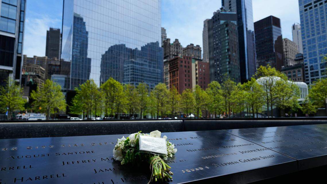 A bouquet of flowers with a note from Britain's King Charles and Queen Camilla lies at the 9/11 Memorial, during their state visit to the United States on Wednesday in New York.
