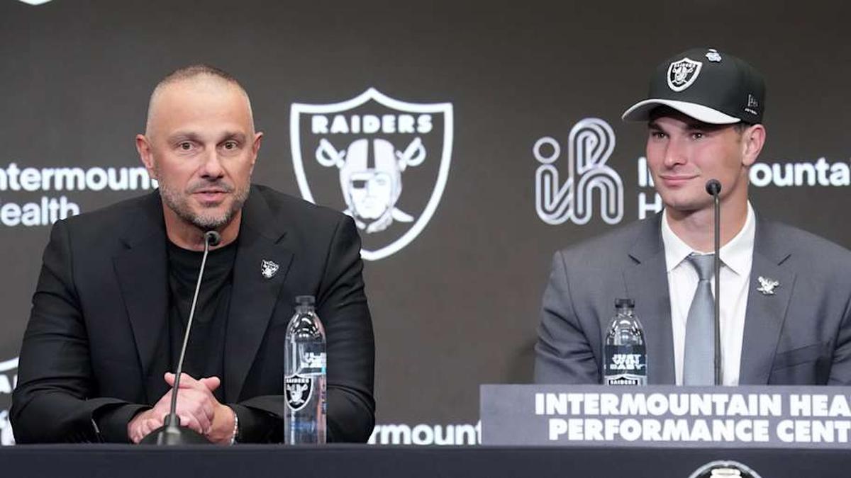  Apr 24, 2026; Henderson, NV, USA; Las Vegas Raiders quarterback Fernando Mendoza (right) and general manager John Spytek at introductory press conference at Intermountain Health Performance Center after being selected as the No. 1 pick in the 2026 NFL Draft. Mandatory Credit: Kirby Lee-Imagn Images | Kirby Lee-Imagn Images 