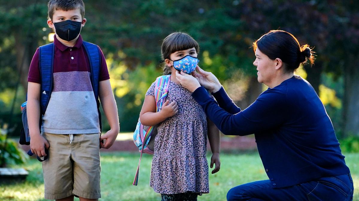 School districts across the country have gone back and forth on whether to require masks.
