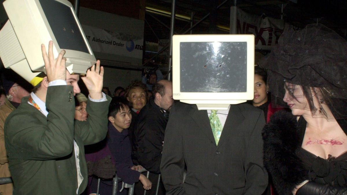 Computer costumes draw stares October 31, 2000, during the annual New York City Halloween Parade. On May 4, 2000, the "I Love You" virus crashed computers around the world. File Photo by Ezio Petersen/UPI