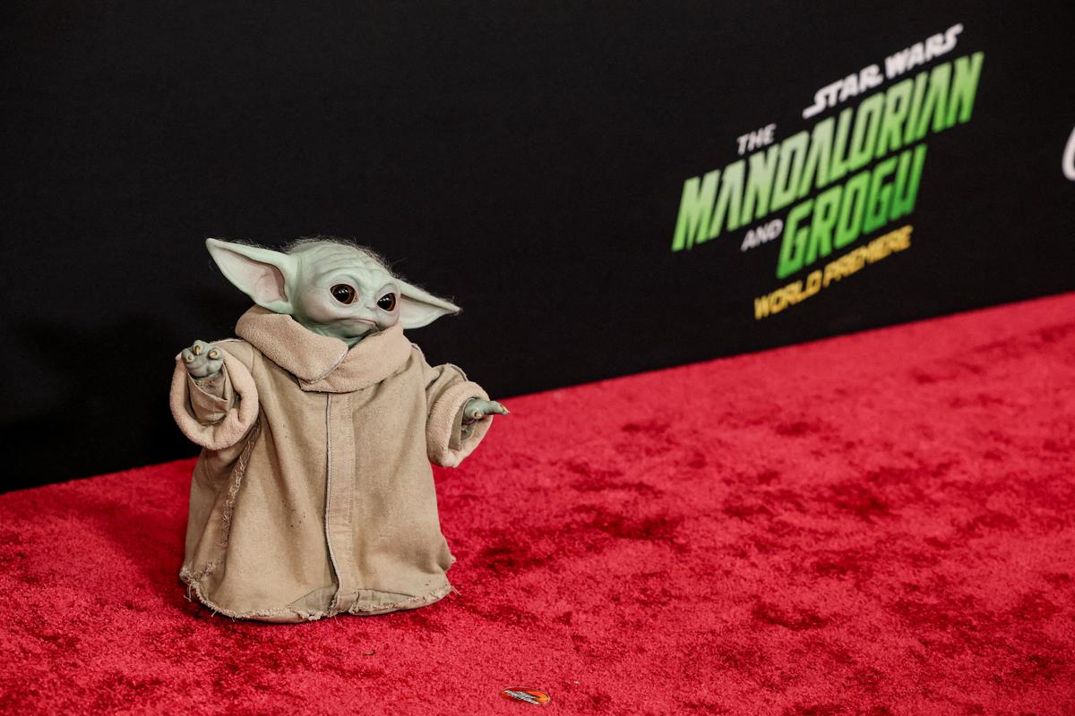 FILE PHOTO: Grogu attends a premiere for the film Star Wars: The Mandalorian and Grogu at TCL Chinese theatre in Los Angeles, California, U.S., May 14, 2026. REUTERS/Mario Anzuoni/File Photo