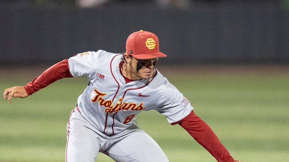  USC's Kevin Takeuchi, left, picks off Oregon utility Jack Brooks at second as the Oregon Ducks host the USC Trojans on May 14, 2026, in Eugene, Oregon. | Ben Lonergan/The Register-Guard / USA TODAY NETWORK via Imagn Images 