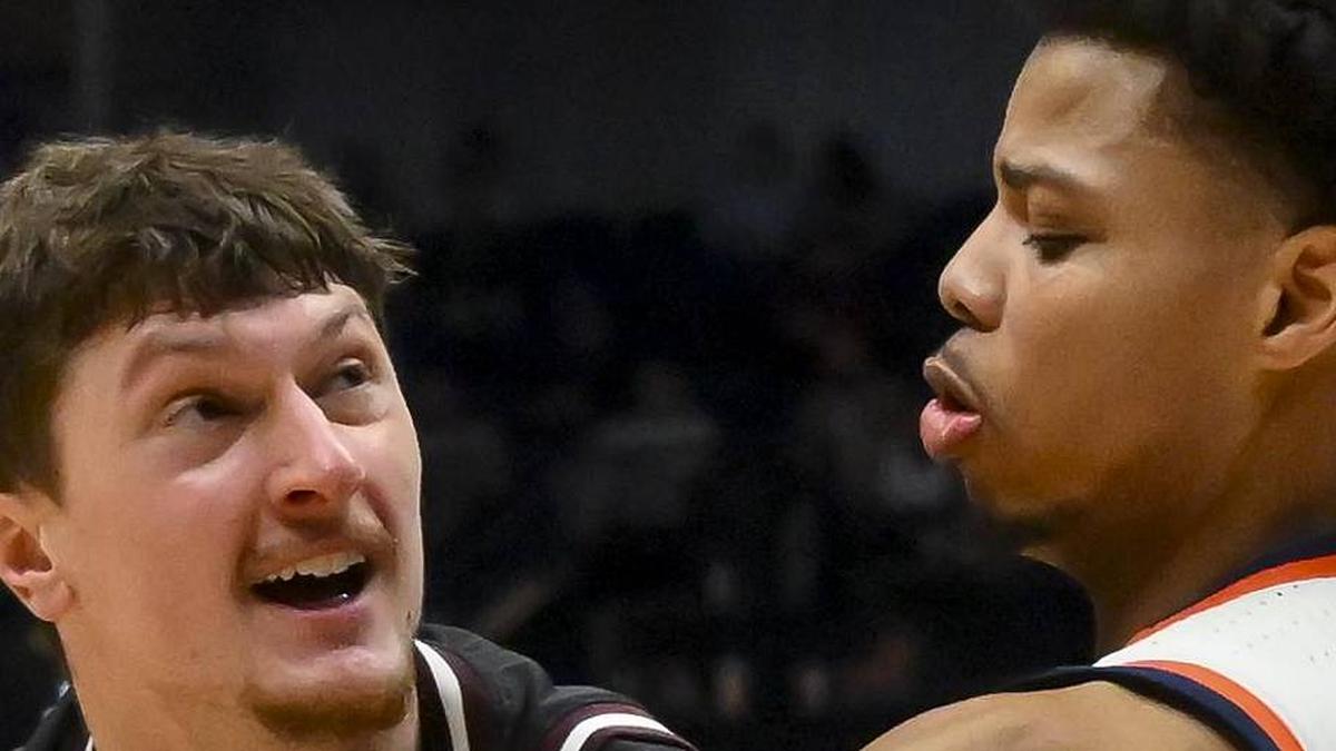  Mar 11, 2026; Nashville, TN, USA; Auburn Tigers guard Keyshawn Hall (7) strips the ball from Mississippi State Bulldogs forward Sergej Macura (11) during the second half at Bridgestone Arena. Mandatory Credit: Steve Roberts-Imagn Images | Steve Roberts-Imagn Images 