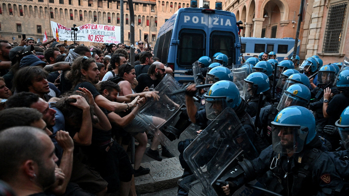 Police clash with protesters in Bologna after man dies during arrest attempt 