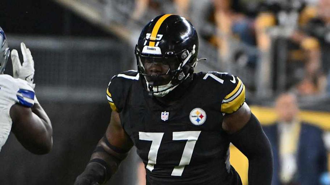  Oct 6, 2024; Pittsburgh, Pennsylvania, USA; Pittsburgh Steelers offensive tackle Broderick Jones (77) pass blocks during the first quarter against the Dallas Cowboys at Acrisure Stadium. Mandatory Credit: Barry Reeger-Imagn Images | Barry Reeger-Imagn Images 