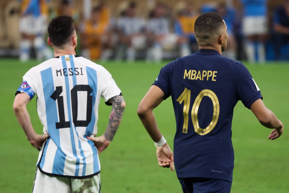  A view of Lionel Messi #10 of Argentina and Kylian Mbappe #10 of France back during the FIFA World Cup Qatar 2022 Final Photo by Zhizhao Wu/Getty Images