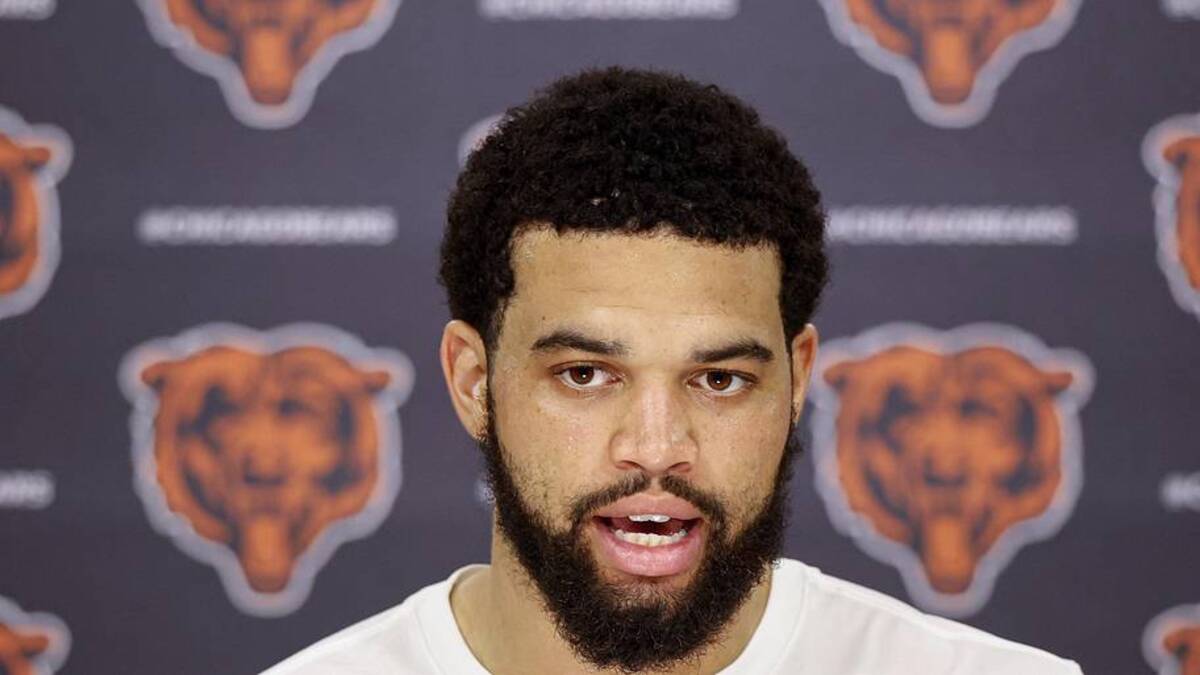  Jun 11, 2026; Lake Forest, IL, USA; Chicago Bears quarterback Caleb Williams (18) speaks during Minicamp at Halas Hall. | Kamil Krzaczynski-Imagn Images 