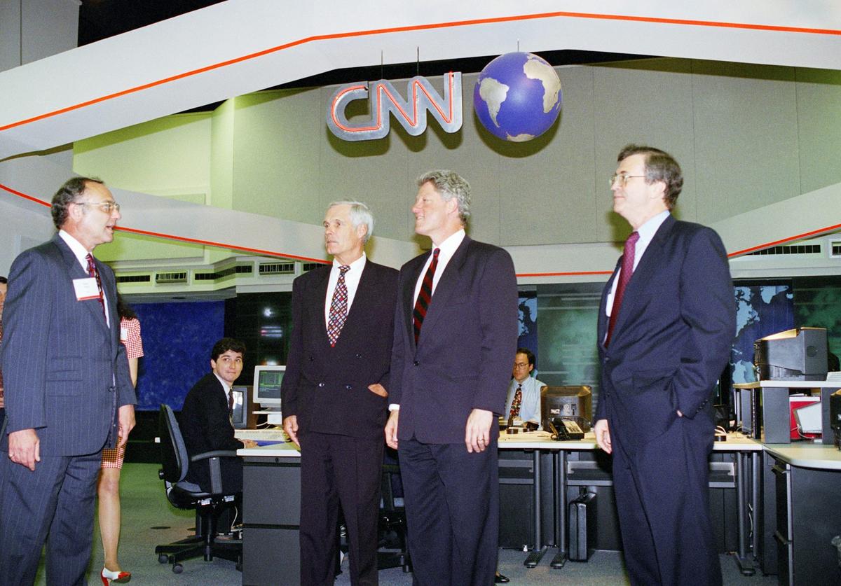  President Bill Clinton tours CNN's new studios in Atlanta with Ted Turner on May 3, 1994. AP Photo/Dennis Cook 
