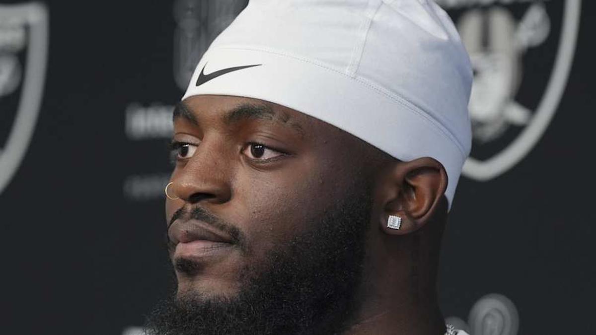  May 2, 2026; Henderson, NV, USA; Las Vegas Raiders defensive end Keyron Crawford (42) speaks during a news conference at the team's Rookie Minicamp at Intermountain Health Performance Center. Mandatory Credit: Candice Ward-Imagn Images | Candice Ward-Imagn Images 